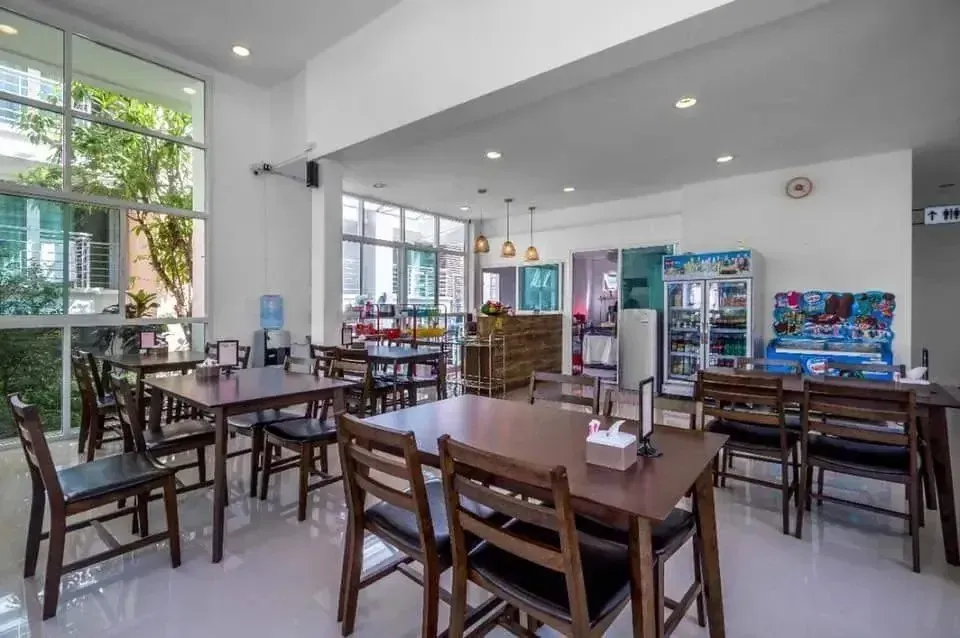 On-site restaurant and dining area with wooden tables and cozy lighting